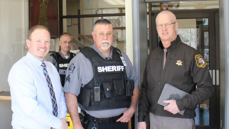 From left to right is Judge Joshua Farrell, Mike Smith, Trevor Demoines, and Sheriff Mike Shea at the Gladwin County Courthouse.
