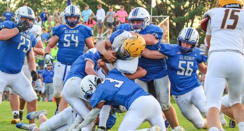 The Gladwin Flying G’s tackle the opposing Ogemaw player at the season opener on August 25. PHOTO PROVIDED BY KIERSTIN HALE