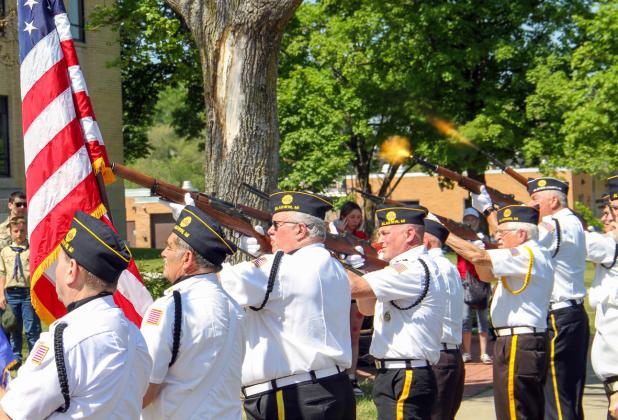 American Legion Post 171 members fire off a gun salute during Gladwin’s Memorial Day ceremony on Monday, May 29.